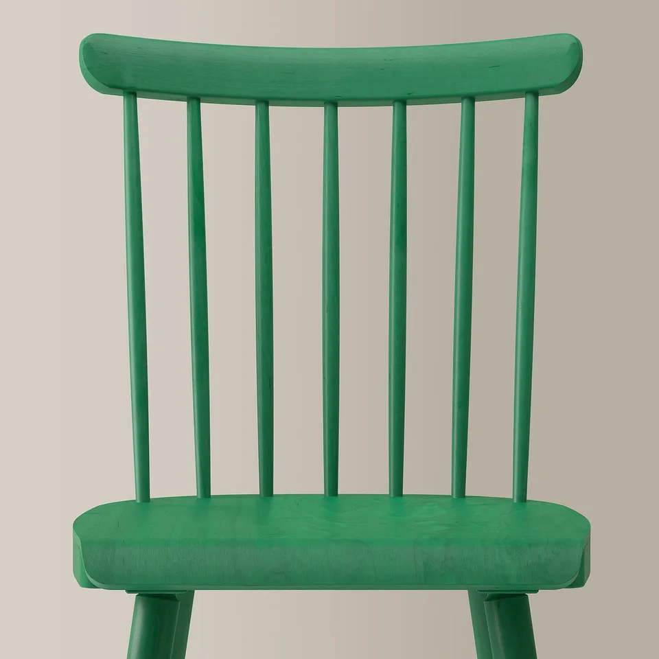 Bright green wooden chair with smooth finish and curved backrest, featuring vertical slats and sturdy design.
