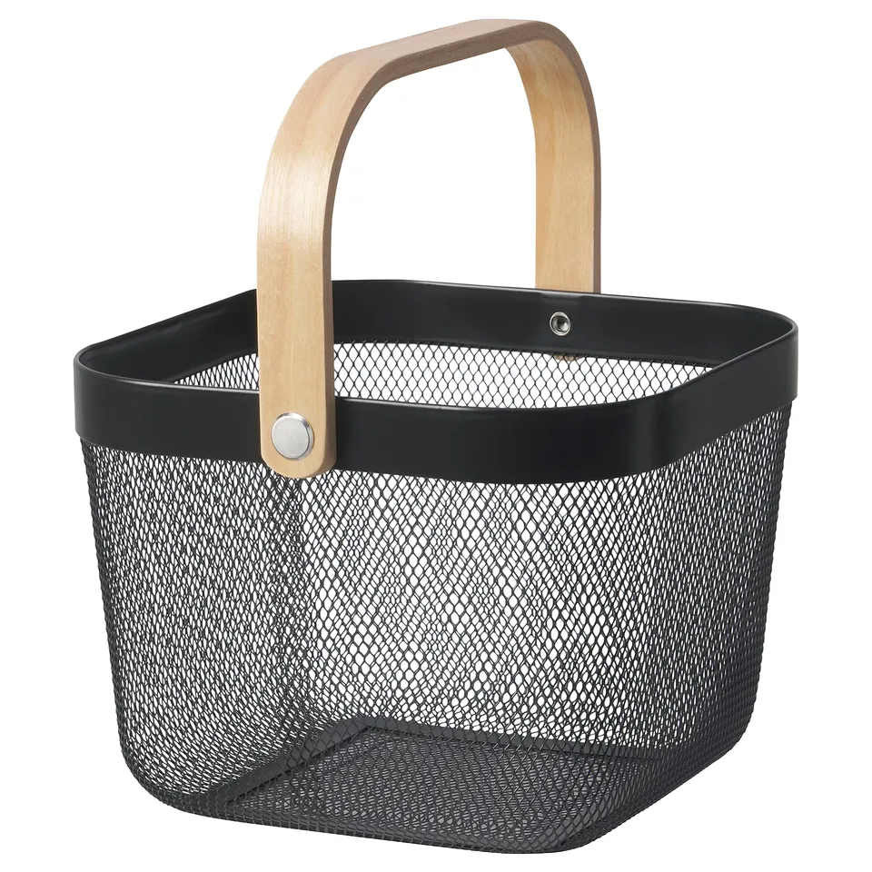 The RISATORP basket is black with a wooden handle, featuring a mesh design for easy visibility and portability.