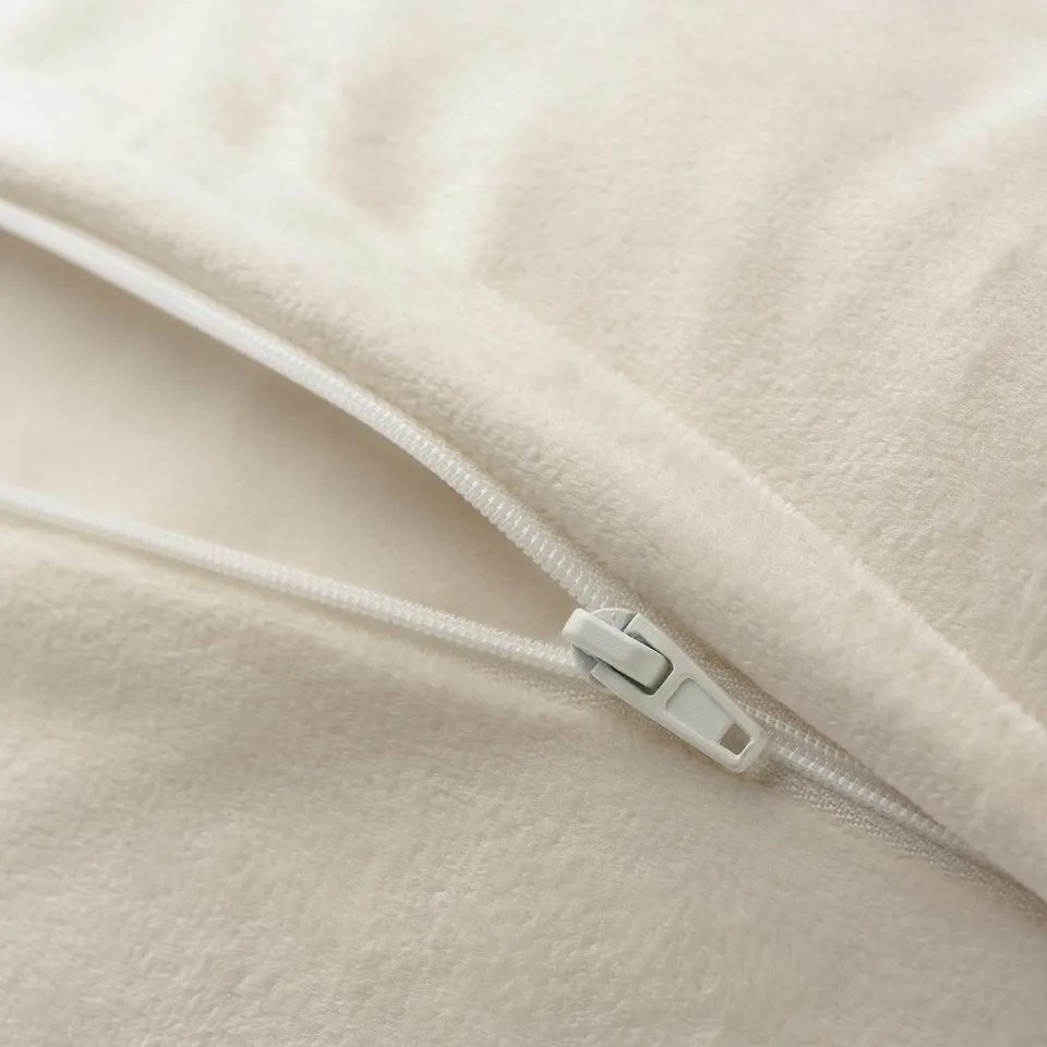 Zippered soft cushion cover, made from recycled polyester.
