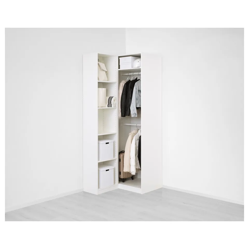A white PAX wardrobe unit with folding clothes storage, shelves, and hanging space.