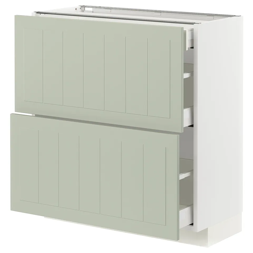 Modern kitchen unit in light green with two drawers and two cabinet doors, sleek and minimalist design.