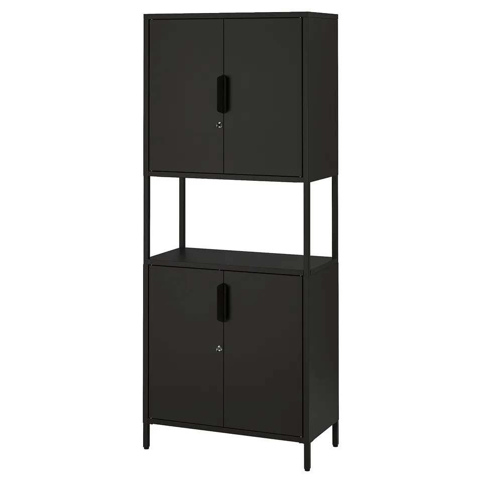A black TROTTEN storage cabinet with two doors, made of metal. It has a rectangular shape with adjustable feet.