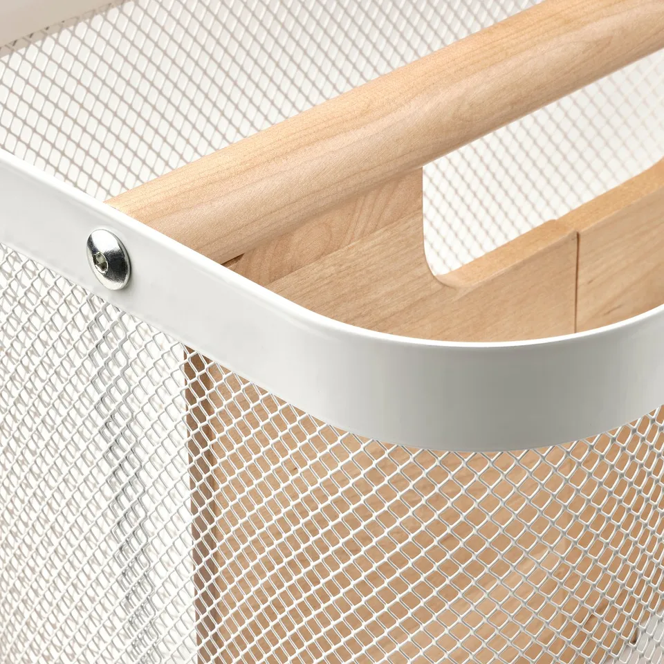 Close-up of stylish storage basket with wooden divider and metal mesh, showcasing high-quality materials and design.