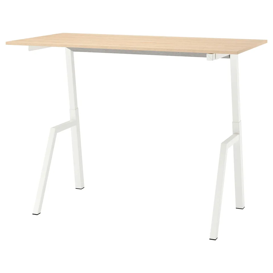 Minimalist sit/stand desk with light wood top and white legs. Adjustable for comfort and ergonomics.