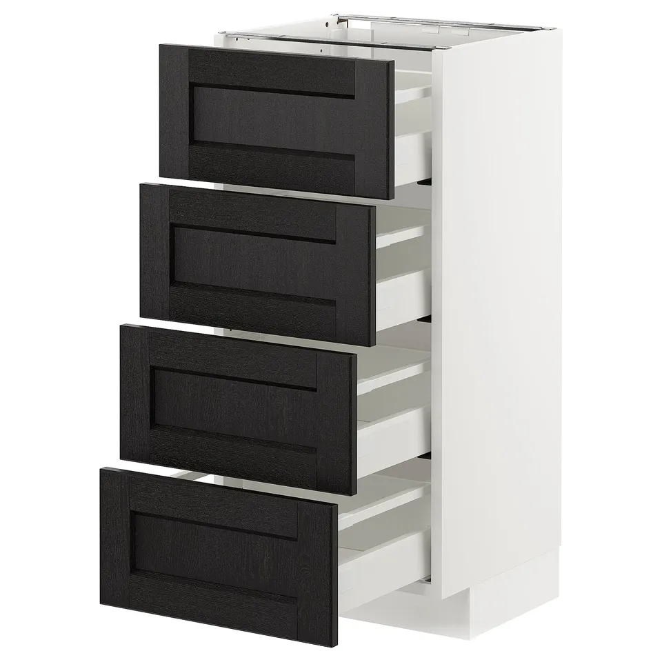 A white METOD kitchen cabinet with four black ash drawers, featuring bevelled edges and a traditional design.