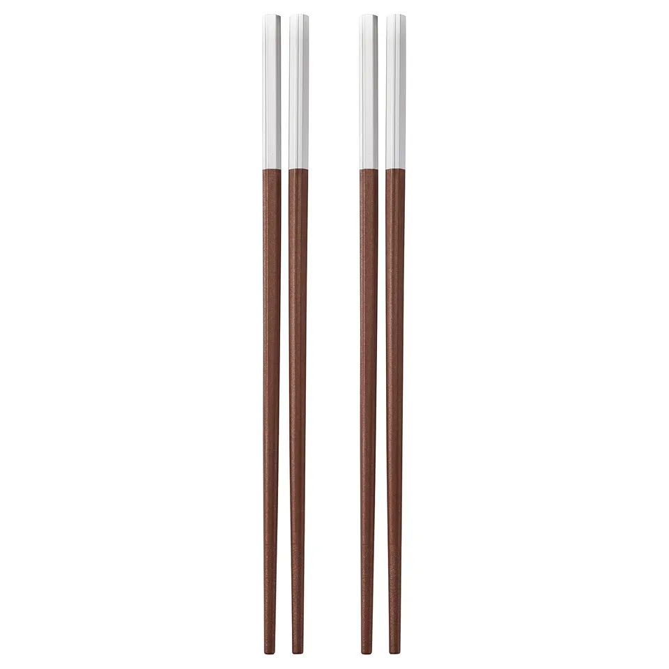 SÖTBJÖRNBÄR chopsticks shown in pairs, silver cap, dark brown, octagonal shape, grip-friendly surface.