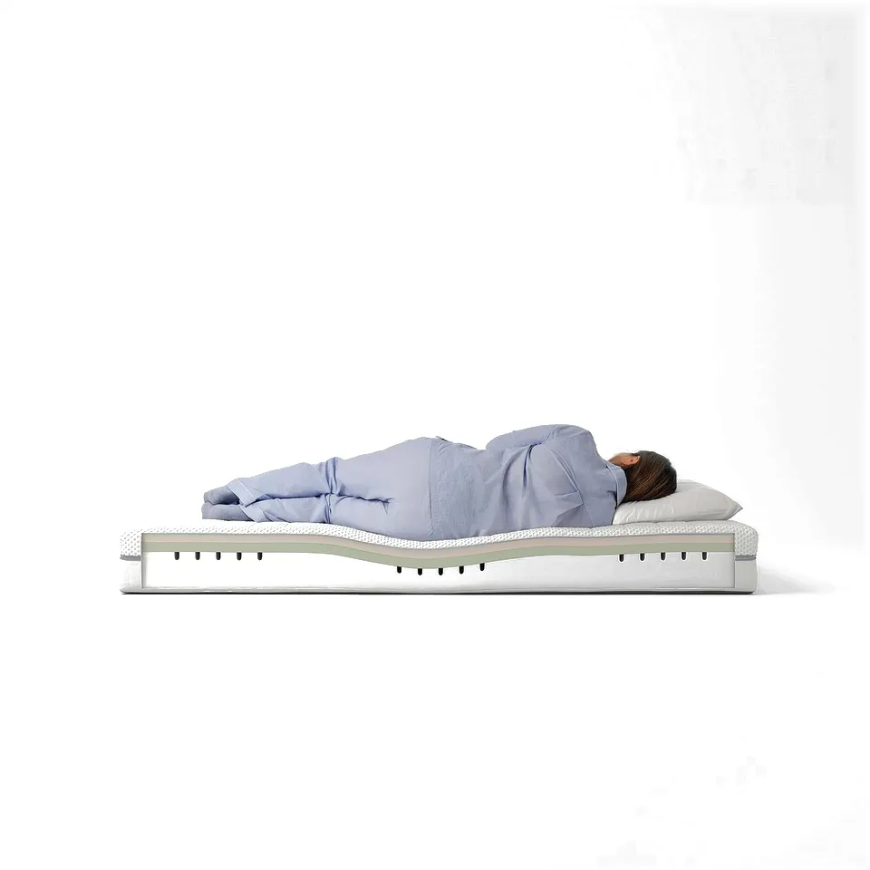 A person sleeping on a light blue ÅKREHAMN mattress with three layers of foam for comfort and support.