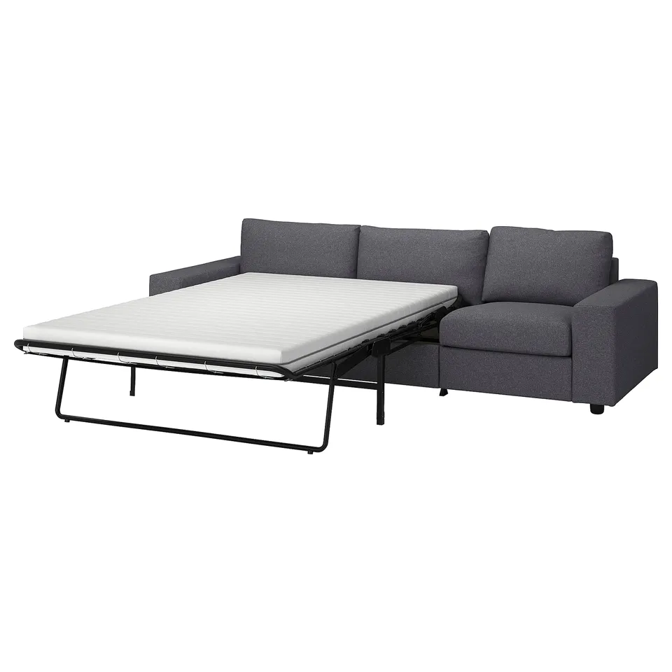 Modern grey convertible sofa with extendable bed, sleek metal legs, and comfortable cushions.