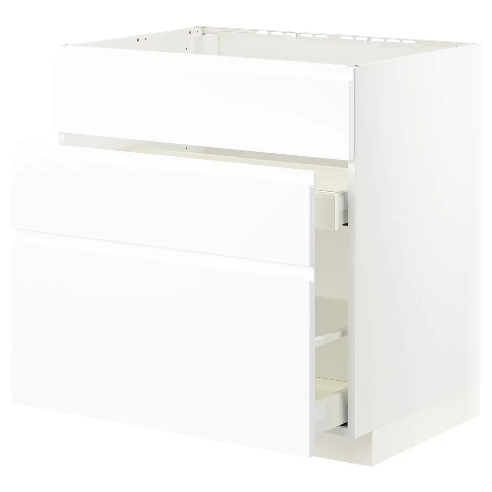 White METOD cabinet with smooth drawers, minimalist design.