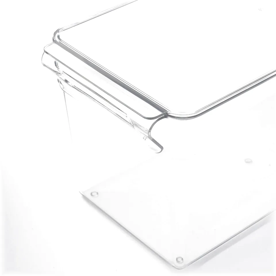 Clear, stackable plastic fridge storage box with a secure handle, perfect for organising.