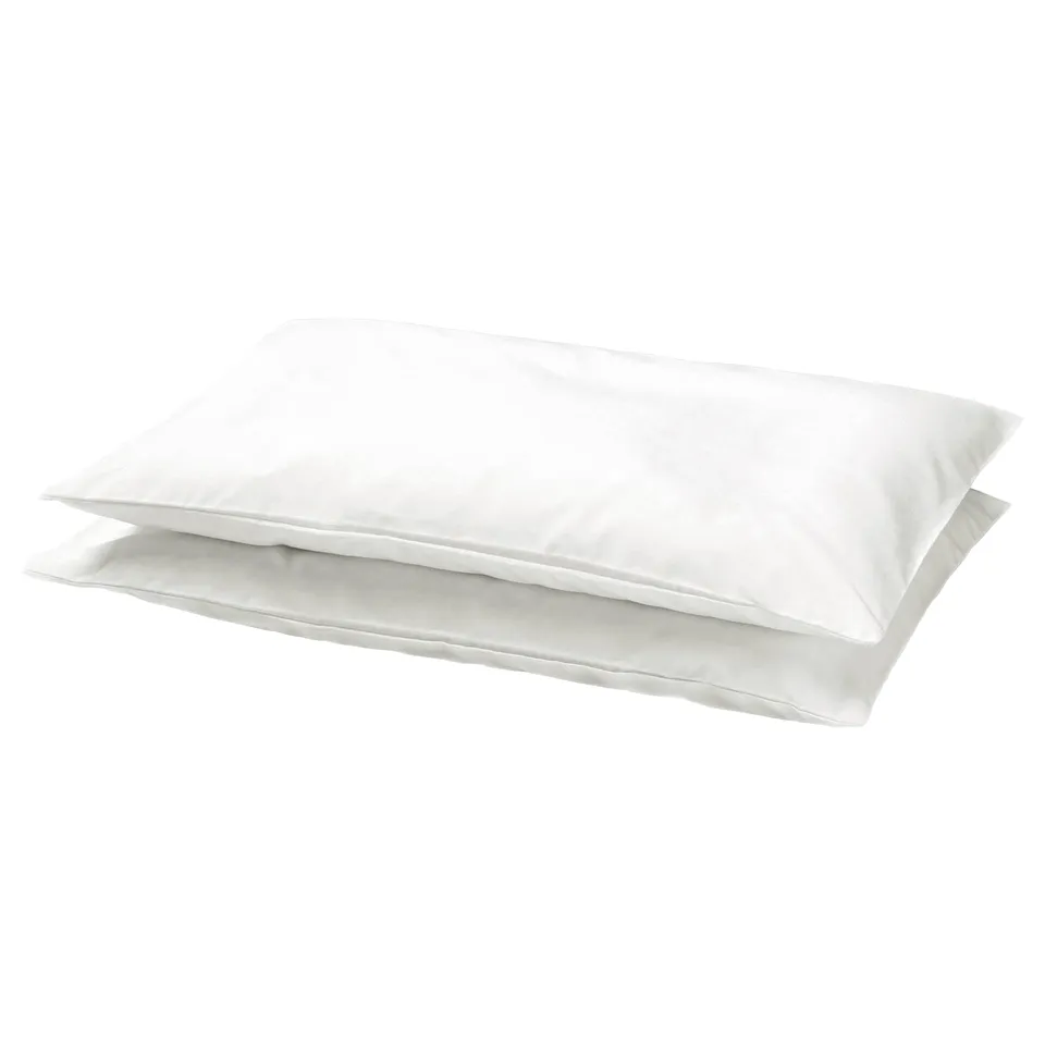 Two stacked white pillowcases, designed for a childs pillow, rectangular shape, simple design.