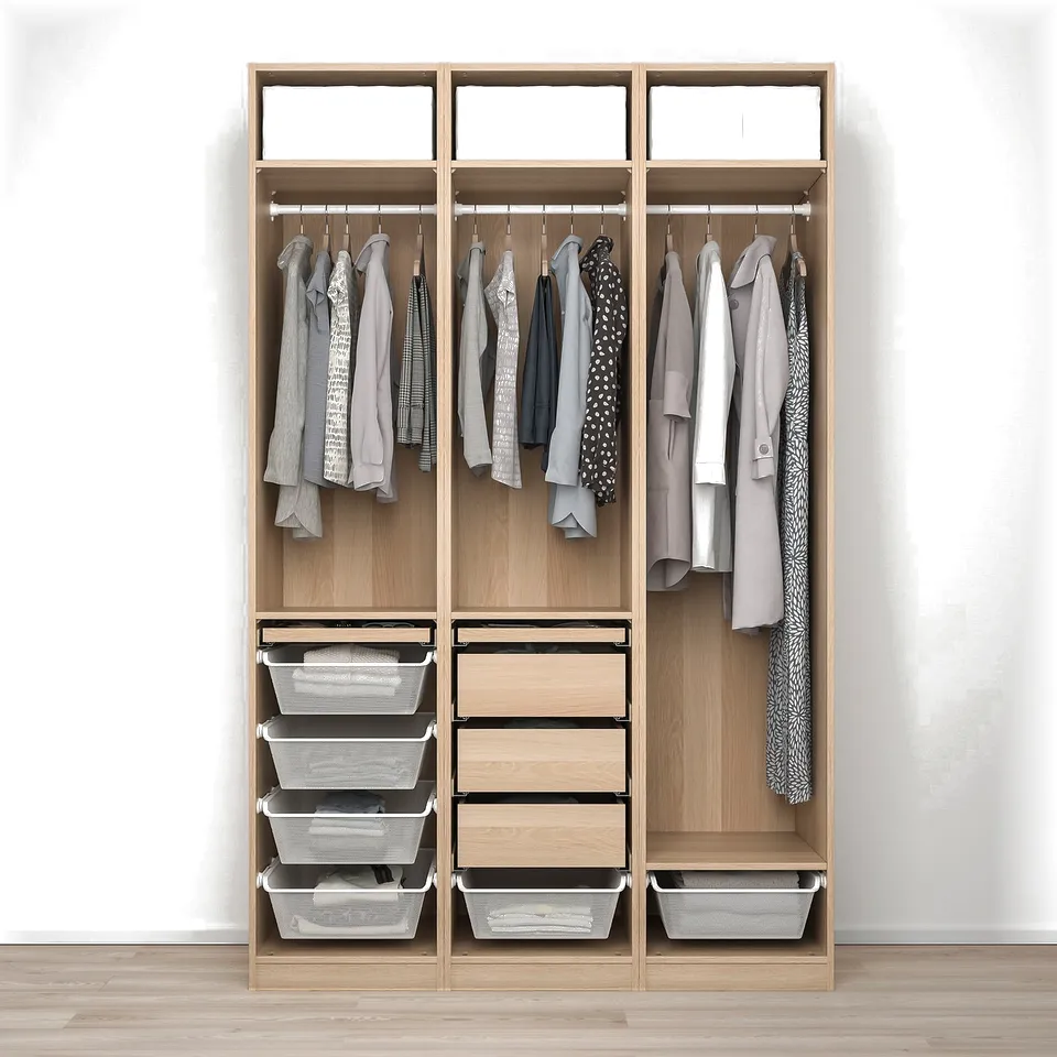 Modern closet with hanging shirts, drawers, and storage baskets.