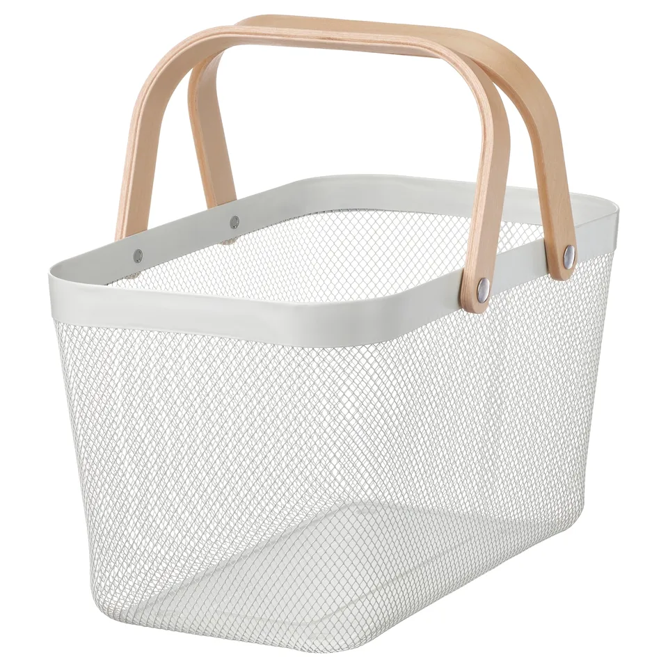 A white RISATORP basket with wooden handles and metal accents. Its rectangular and mesh-sided, ideal for storage and organisation.