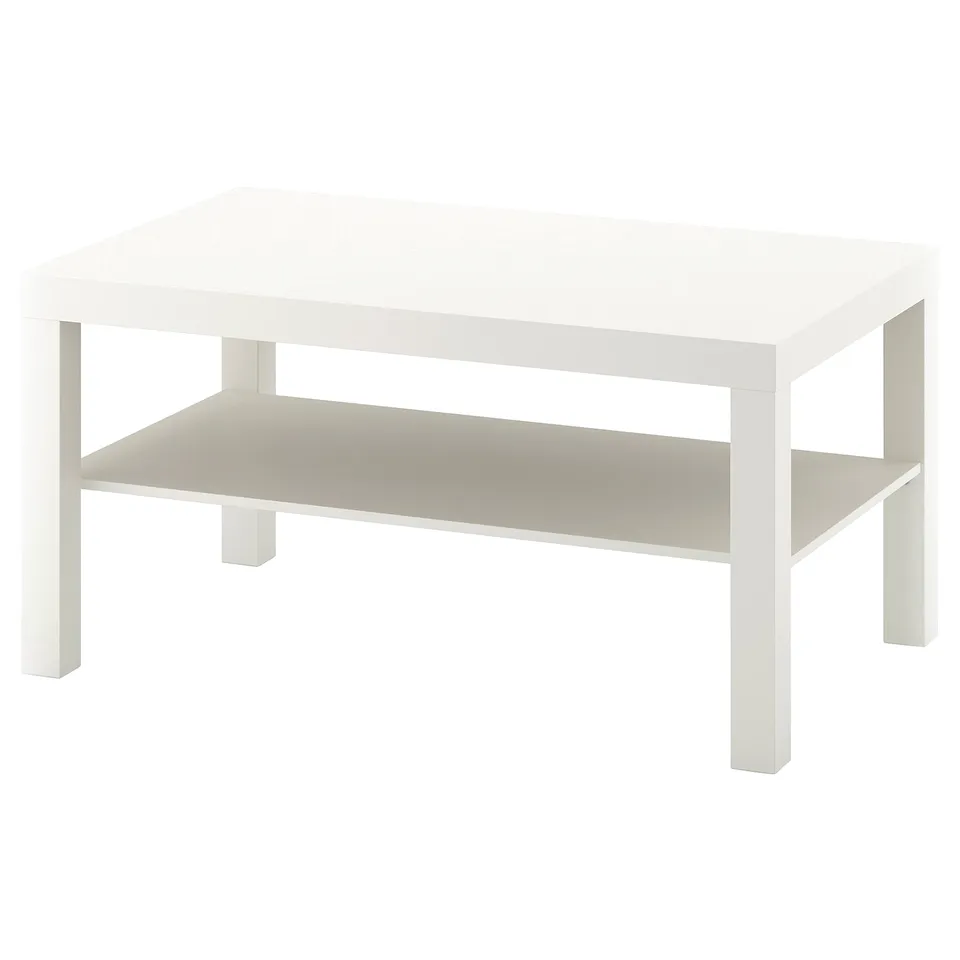 A LACK coffee table, white, rectangular with a single shelf.