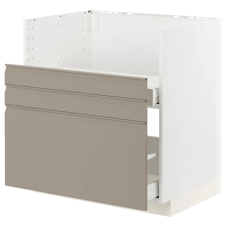 METOD kitchen unit with beige-brown drawers, three shelves, metallic handles.