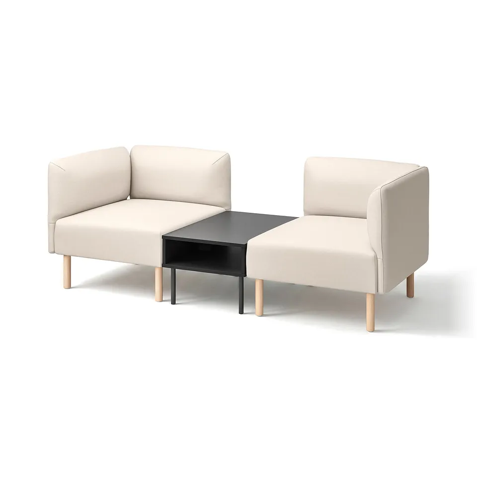 Two-beige-modular-sofas-with-wooden-legs-and-black-side-table.