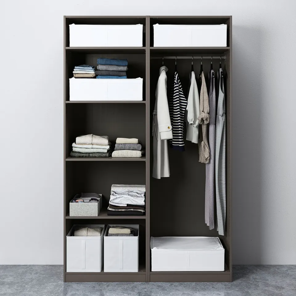 A modern closet with shelves and hangers, storing neatly folded clothes and garments.