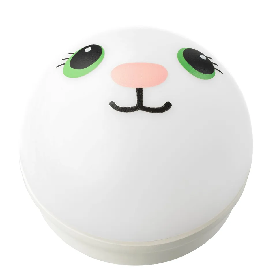 Round, white, childs night light with green eyes, black nose, and mouth, made from abs plastic.