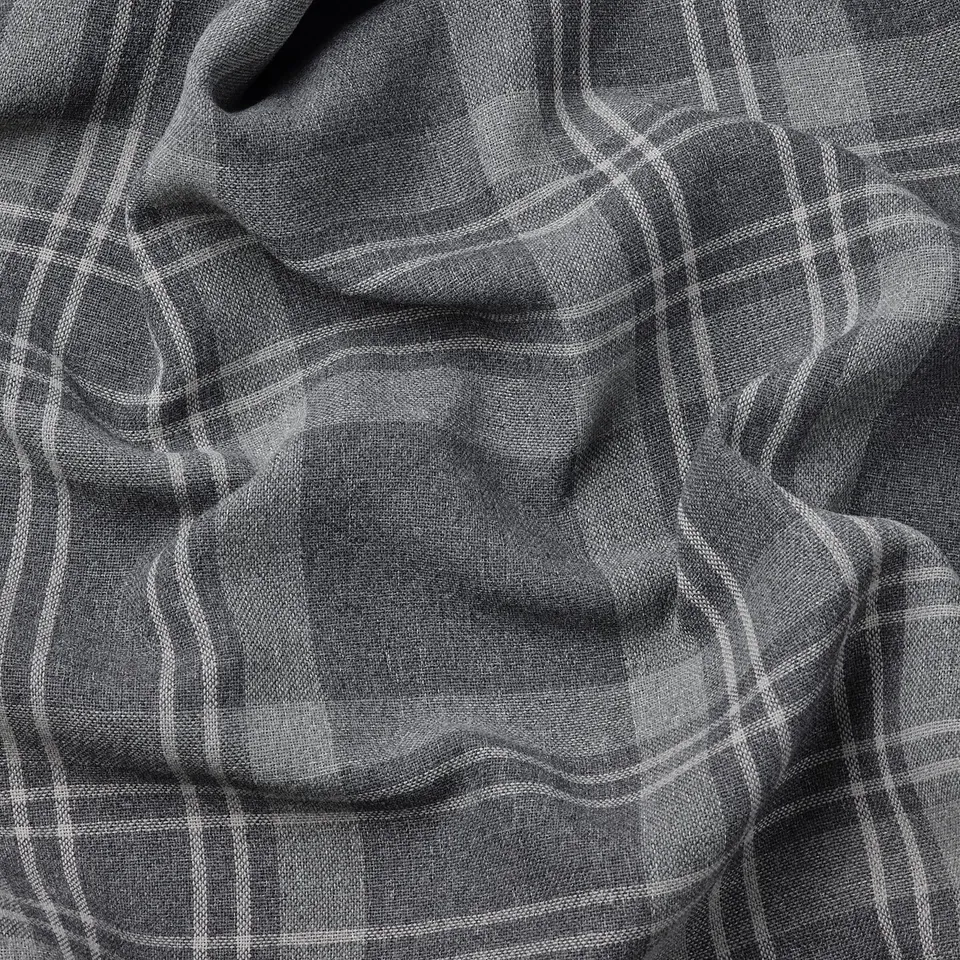 Close-up of dark grey plaid curtains, neatly draped, showing quality texture and pattern.