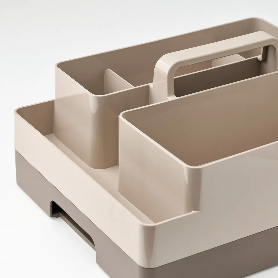 Desk organiser with multiple compartments, sturdy, beige, handle on top.