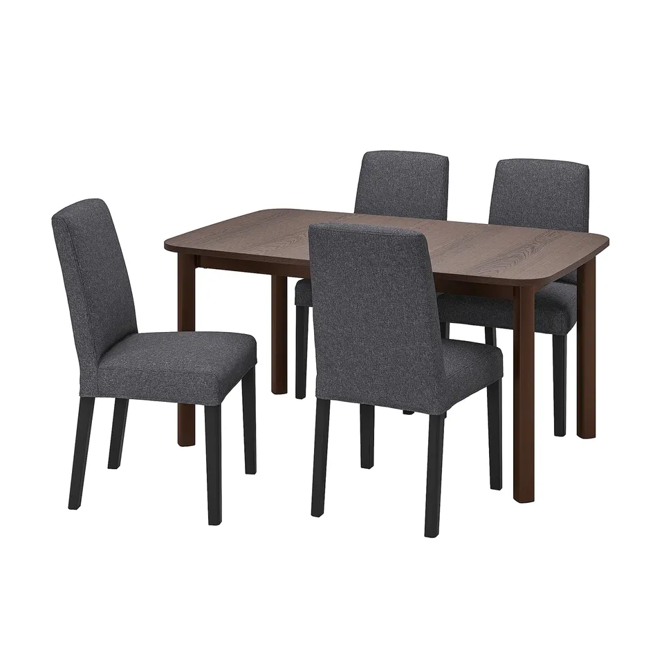 A STRANDTORP dining set with a wooden table and four grey fabric chairs.