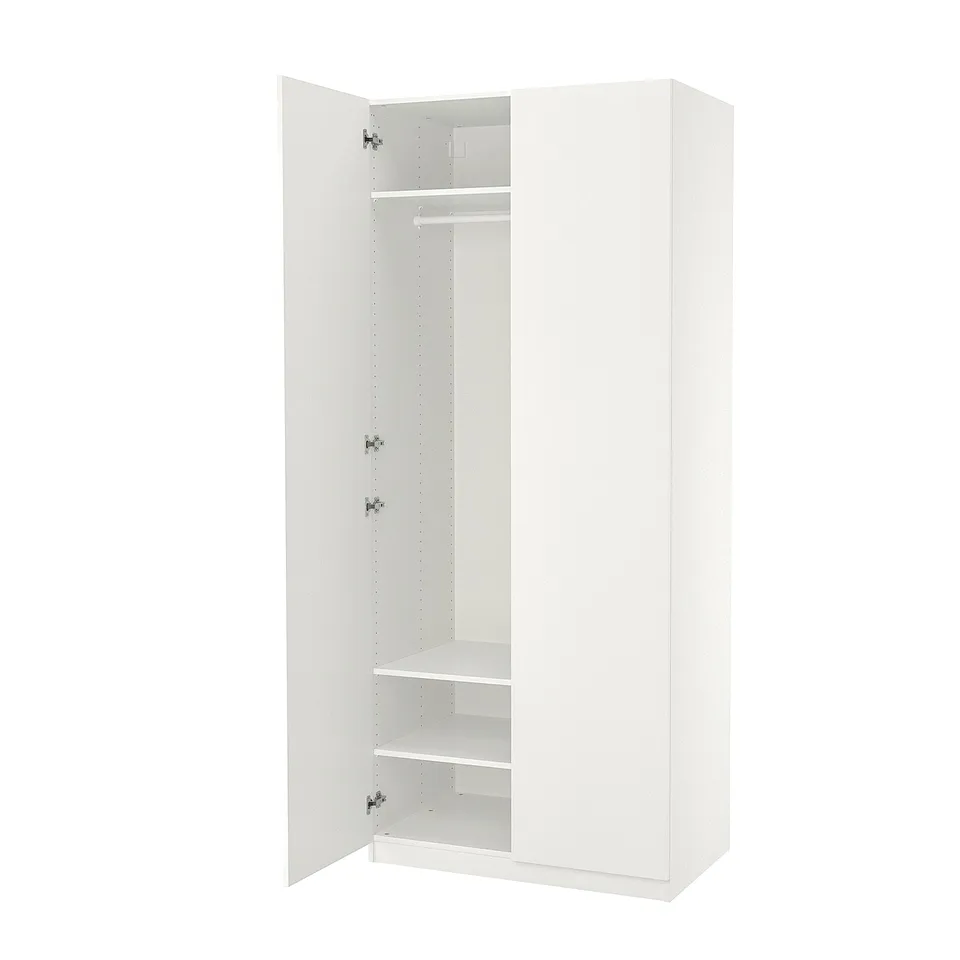 White PAX wardrobe with open doors, hanging rail, and shelf inside. Modern minimalist design.