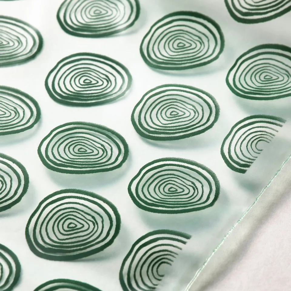 Fresh, reusable greens-patterned bags with secure seals, ideal for food storage.