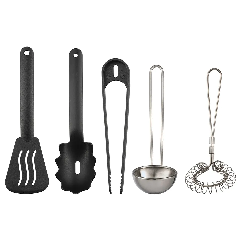 Five black kitchen tools, including spatulas, tongs, ladle, and whisk, arranged neatly on a white background.