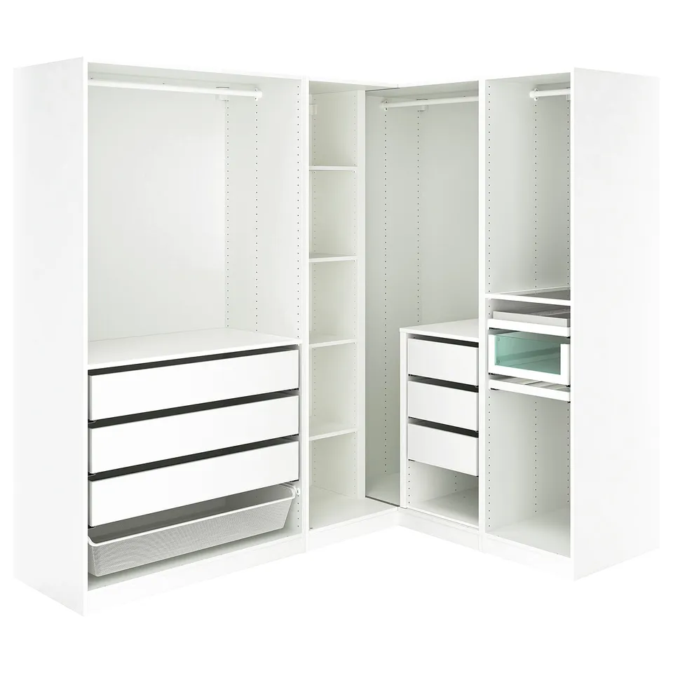 A white corner PAX wardrobe system with drawers, shelves, and storage compartments.