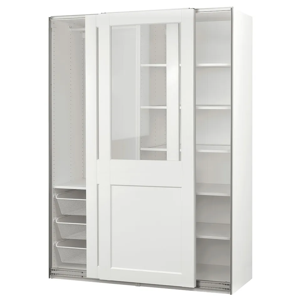 Modern white PAX wardrobe with clear glass doors clothes. Mesh baskets and adjustable shelves. Sleek, sliding door design.