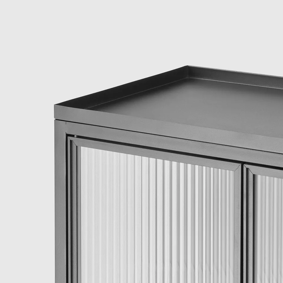 Black modern cabinet with textured glass doors, sleek design, and adjustable feet, standing against a white background.