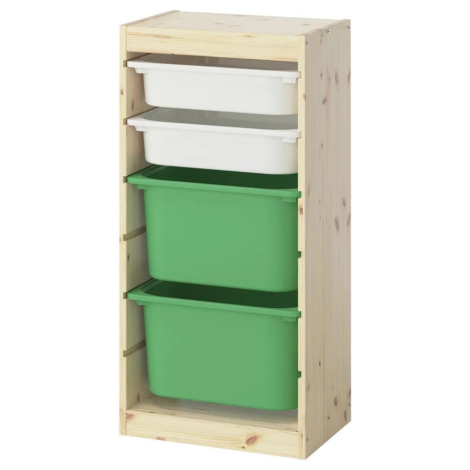 The TROFAST storage unit in natural wood with green and white containers. It has three shelves holding two large green bins and two white bins.