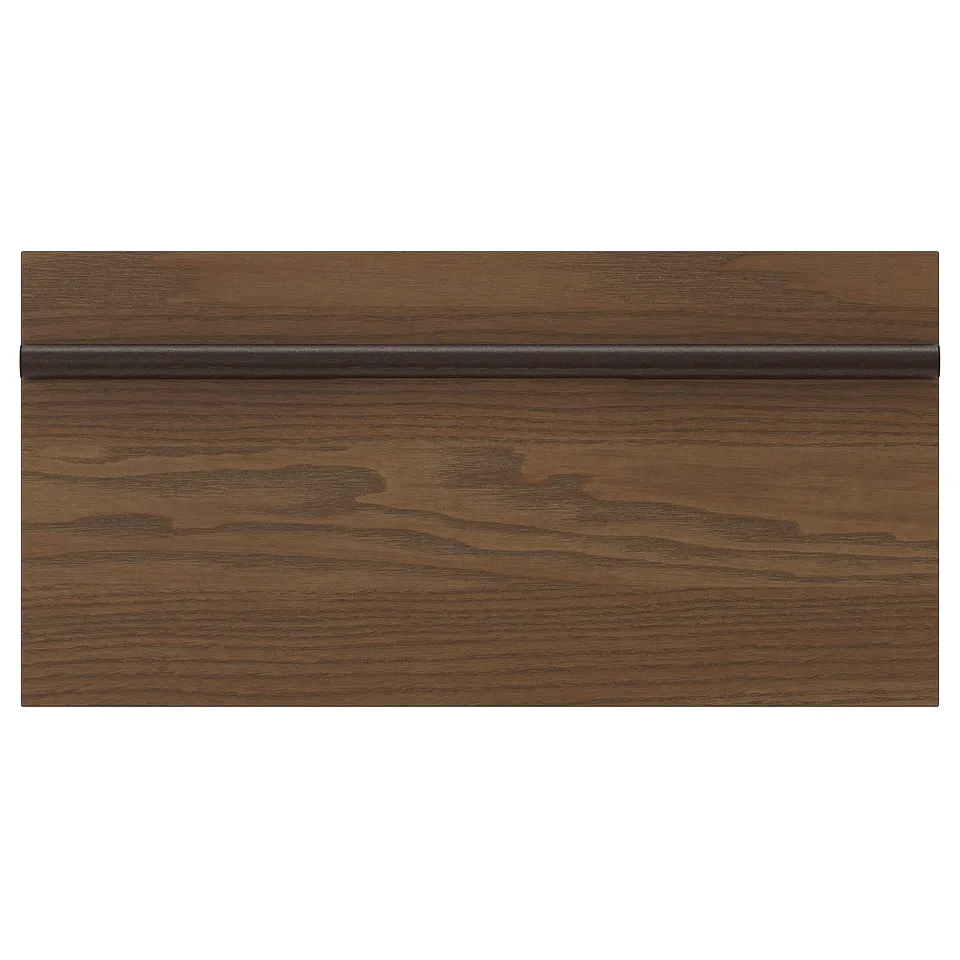 A dark brown stained ash veneer STENSTA kitchen cabinet front with a wide solid wooden handle.