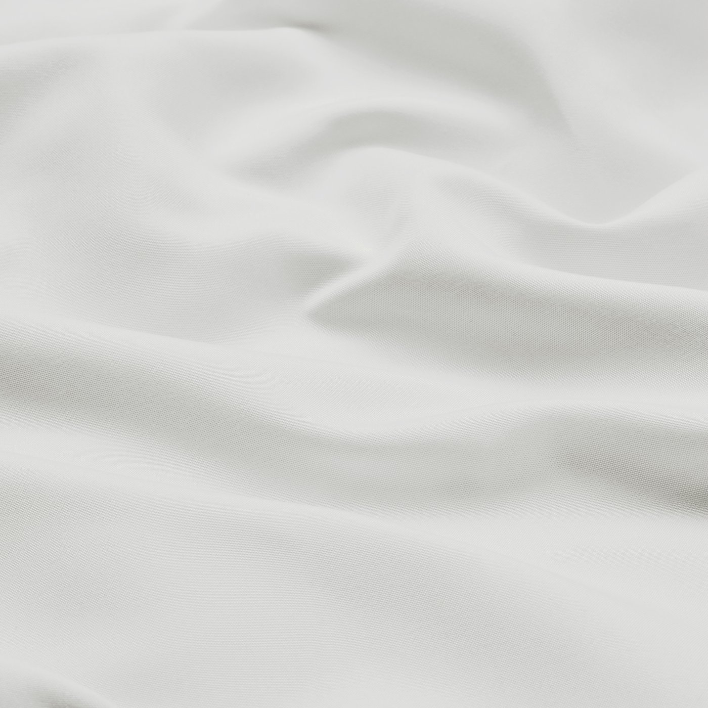 Soft, white pillowcase with a smooth, brushed texture, made from 100% recycled polyester.