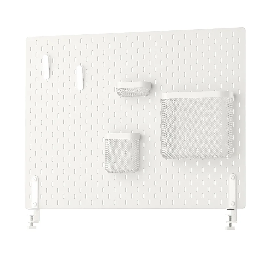 SKÅDIS white pegboard set with mesh baskets and clips on a white background.