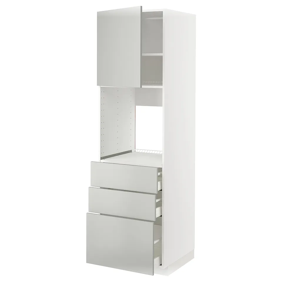 A white METOD kitchen cabinet with light grey havstorp fronts, featuring two drawers and two shelves, with a modern and clean design.