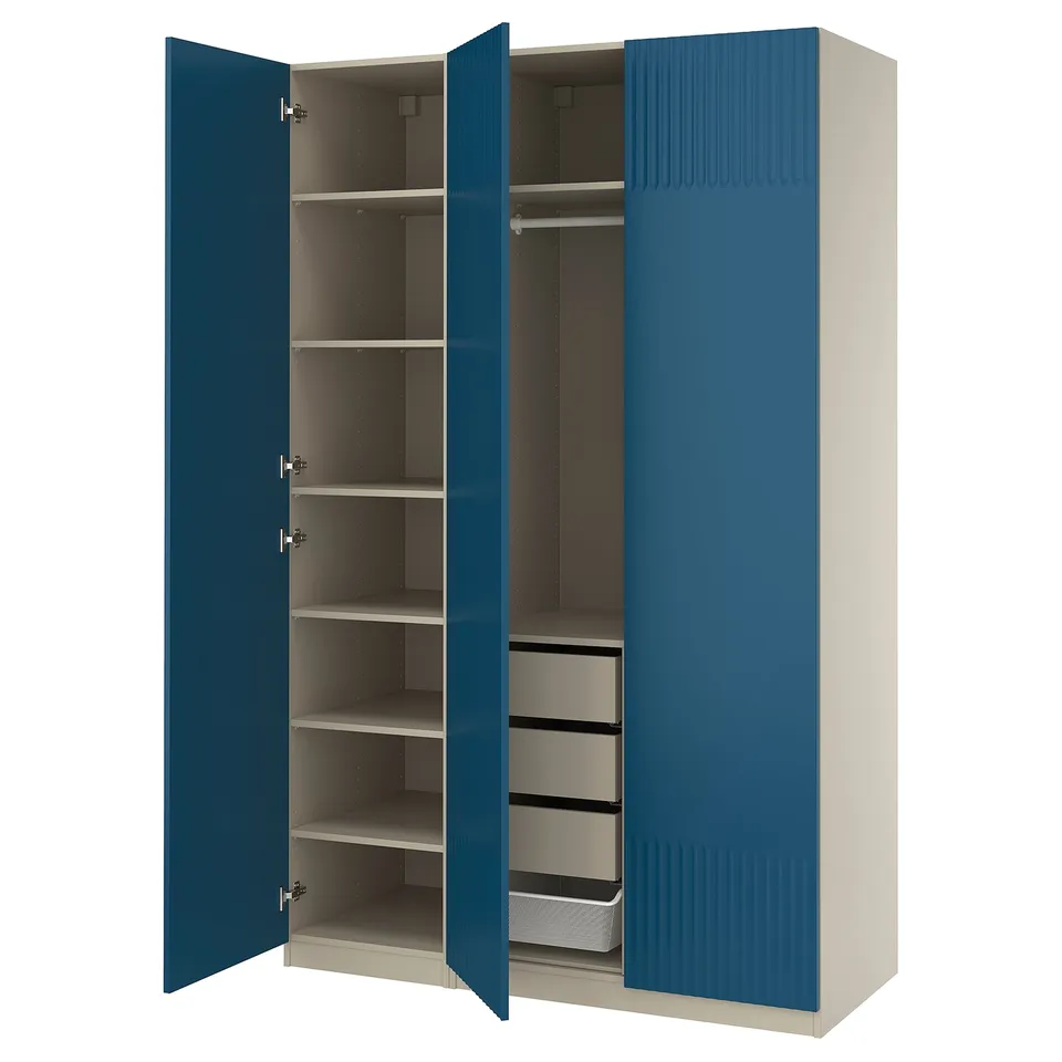 Open blue PAX wardrobe with shelves and drawers.