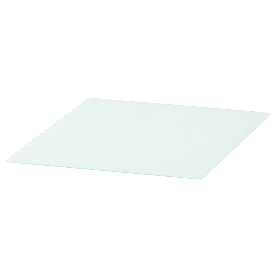 A clear square glass shelf, part of the MALM collection, with a sleek and modern design.