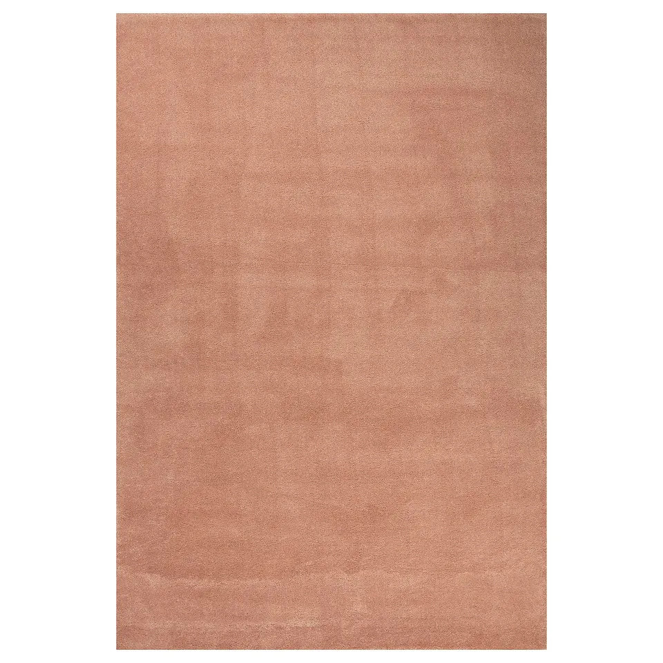 A beige STOENSE rug with a soft, dense pile and subtle sheen. Its rectangular and made of polypropylene and synthetic rubber.