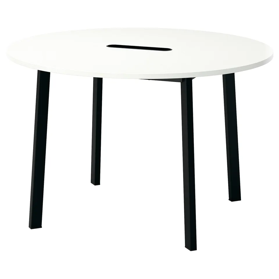 A round white MITTZON conference table with four black metal legs. It has a sleek, modern design.