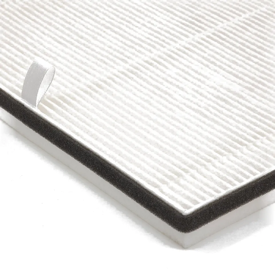White rectangular air philtre with thin parallel lines, black edges, and a small attached loop for handling.