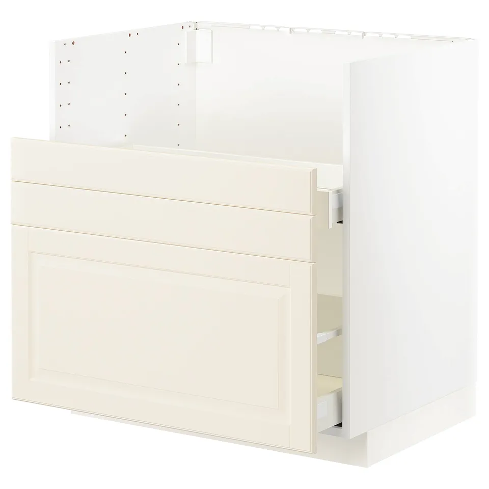 White kitchen cabinet with open drawer, bevelled edges, modern design.