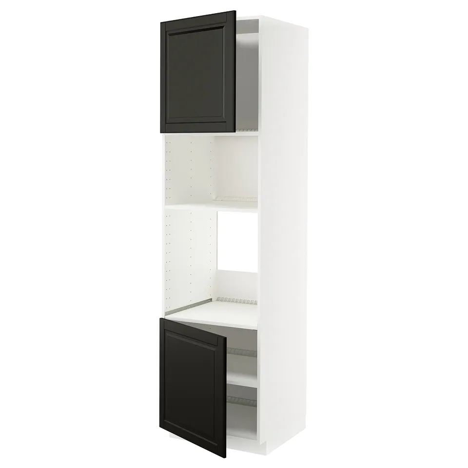 A white METOD kitchen cabinet with black bodbyn doors featuring bevelled edges, including an open door revealing adjustable shelves inside.
