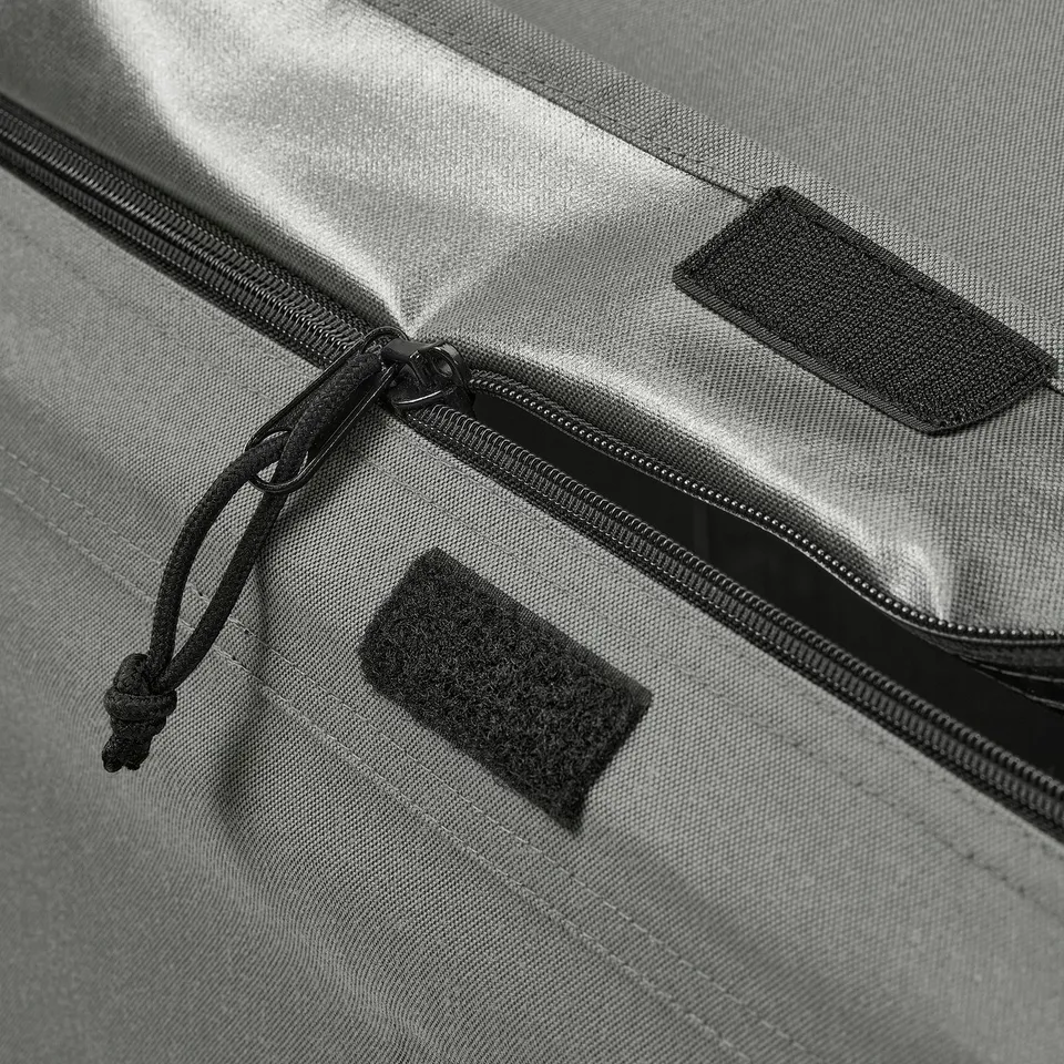 Black waterproof storage box with zippers and handle, designed for outdoor use.