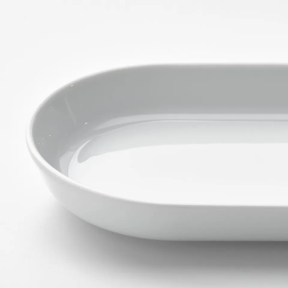 Clean, white, empty bowl, smooth edges, quality glazed porcelain.