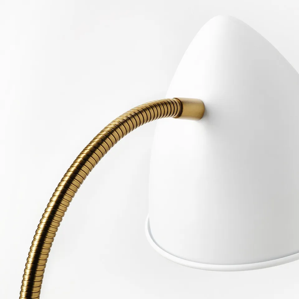 Modern white lamp with flexible gold gooseneck, stylish and functional, led bulb integrated.