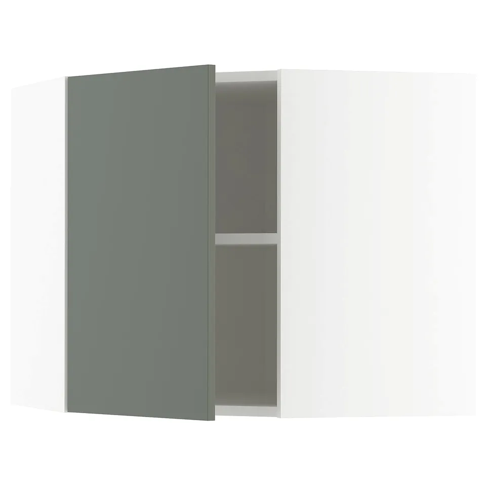 Modern kitchen cabinet in grey-green, open, showing interior shelving.