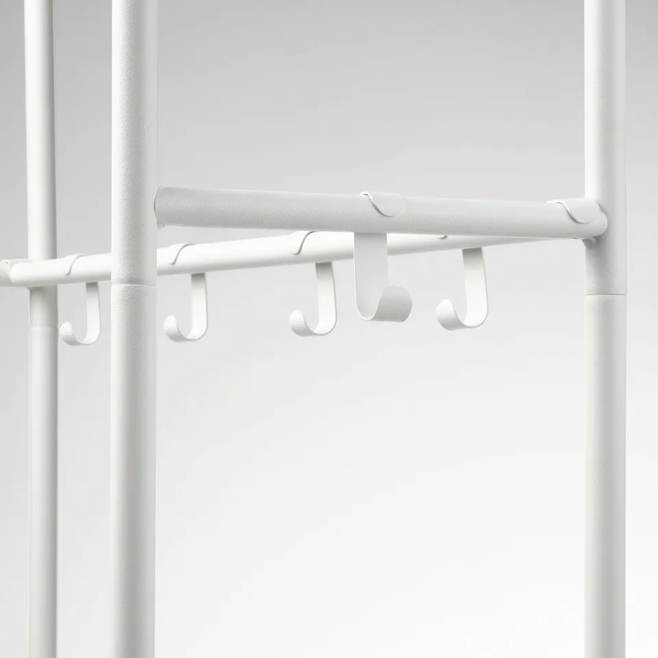 White coat rack with multiple hooks for efficient storage. Modern design with durable, powder-coated finish.