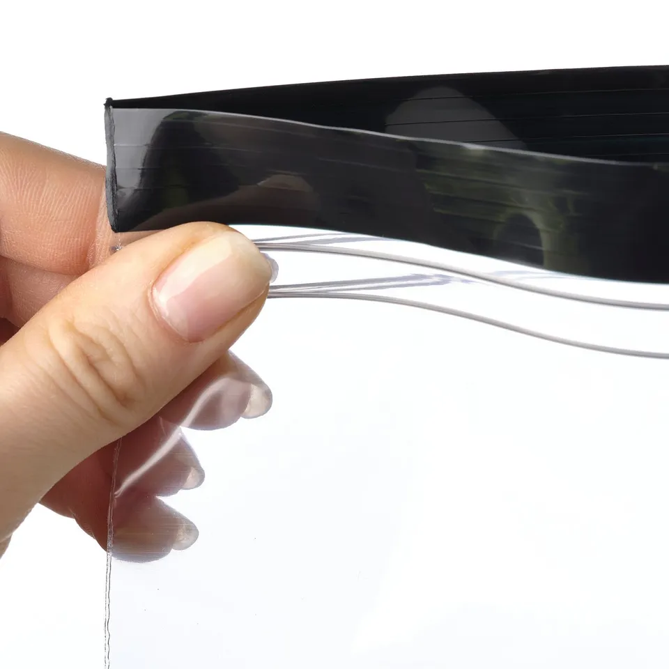 Hand holding transparent reusable bag, demonstrating its resealable function with visible double seal.