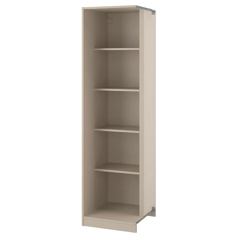 An empty beige PAX corner wardrobe unit. The unit is tall and narrow, designed to fit into corners, and three open shelves for storage.